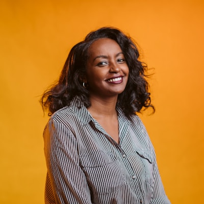 Woman smiling, warm portrait